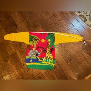 New w tag 80’s Raquel sweater from Peru Safari theme. Size L.